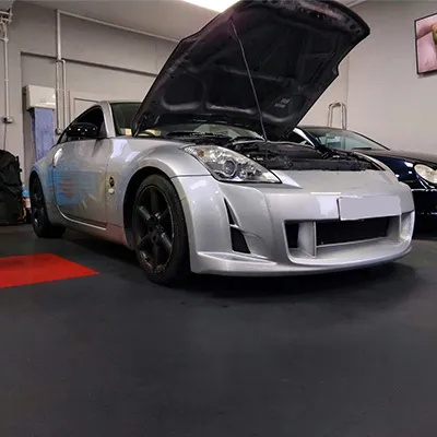 motor out in a silver sports car